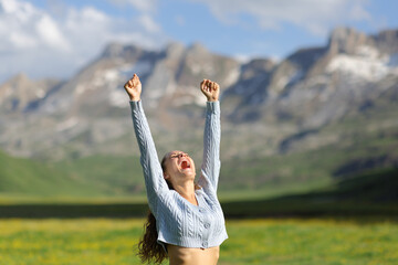 Woman celebrating vacation in nature