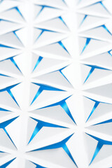 Wall Mural - Abstract geometric background. Triangles cut out in paper. White and blue color.