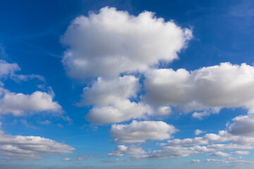 Wall Mural - Blue sky with clouds background overlay. Ideal for sky replacement