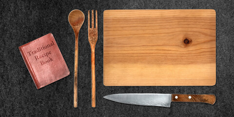 Wall Mural - Topview of Set Cooking Wooden Utensils and Recipe Book on Dark Background