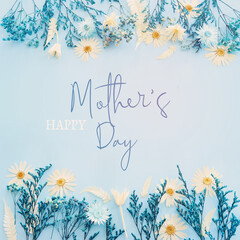 mother's day concept with blue flowers over pastel background