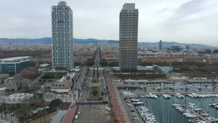 Fototapete - Aerial view of the Barcelona city from above with skyscrapers in the city center. Beautiful Catalania.
