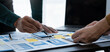 © crizzystudio - ux developers and ui designers, data researchers brainstorm on  tabletop mobile app interface wireframe design with client summary color codes the modern office Creative Digital Development Agency.