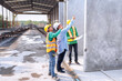 © Tongpool - At building construction site supervisor check quality precast concrete panel before installation