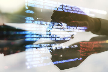 double exposure of abstract creative programming illustration and finger clicks on a digital tablet 