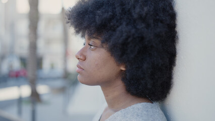 Sticker - African american woman standing with sad expression at street