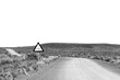 Cattle grid road sign on road R356. Monochrome