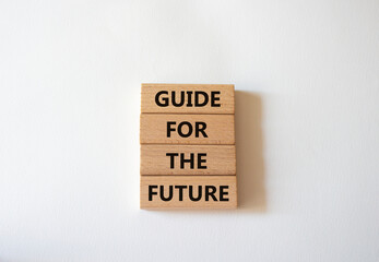 Wall Mural - Guide for the future symbol. Wooden blocks with words Guide for the future. Beautiful white background. Business and Guide for the future concept. Copy space.