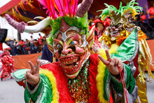 A Man In A Carnival Costume And Mask.