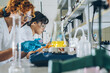 © BalanceFormCreative - Group of female chemistry scientists and students doing experiments in the lab.