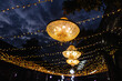 © Oleksii Syrotkin/Stocksy - Chandeliers shining in night