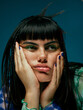© ohlamour studio/Stocksy - Young woman with bored expression