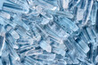 © Yaroslav Danylchenko/Stocksy - Transparent quartz crystals on blue background.