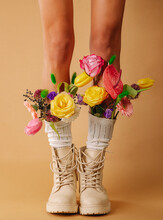 Boots Filed With Flowers 