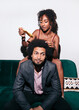 © Lucas Ottone/Stocksy - Black couple styling afro hair