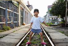 Close Up Asian Little Girl, Playing On The Abandoned Railway