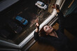 © Vradiy Art/Stocksy - Young woman near the window