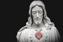 Statue Of Jesus With A Red Heart
