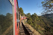 Toy train running from Kalka to Shimla or Simla capital of Himachal Pradesh north India Himalayas. Indian mountain railway	