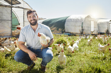Wall Mural - Man on farm, chicken and agriculture with smile in portrait, poultry livestock with sustainability and organic with free range. Happiness, farming and environment, animal and farmer is outdoor