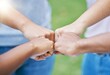 © Lou W/peopleimages.com - People, hands and fist bump in collaboration for community, partnership or trust together in the outdoors. Hand of team bumping fists in unity for agreement, coordination or support in solidarity