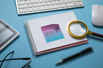 Canvas Print - 24/7 on sticky note with a computer keyboard.