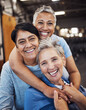 © Siphosethu F/peopleimages.com - Mature women, portrait or hug in training, workout or gym for healthcare wellness, bonding goals or exercise class. Smile, happy or retirement fitness friends in diversity group or community support