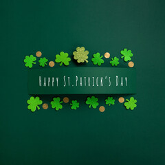 green clover leaves shamrocks on green background. st. patrick's day holiday concept.