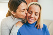 © DisobeyArt - Happy gay couple having tender moment at home - LGBT love concept - Main focus on right woman eye