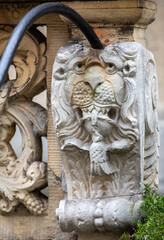 Wall Mural - Stone relief decorating the entrances to houses at Mariacka Street in Gdańsk. Poland