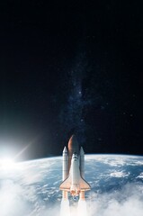 Wall Mural - space shuttle takes off into space. elements of this image furnished by nasa.