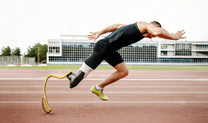 Wall Mural - disabled runner start running on stadium track