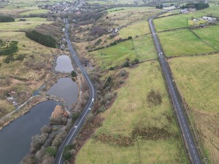 Wall Mural - Aerial view of countryside with lakes and winding roads. Taken in Bury Lancashire England. 