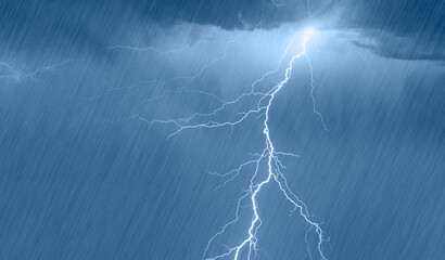 Wall Mural - lightning strikes between stormy clouds with rain