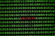 SECURITY in red text surrounded by green computer binary code zeros and ones on screen. 