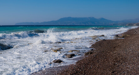 Wall Mural - East shore of Rhodes Island with big waves and rocky beach