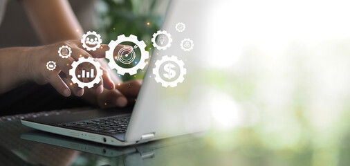success and business target concept, project management, company strategy development in Cogs and gear wheel mechanisms concept.technology on virtual screen conceptimages