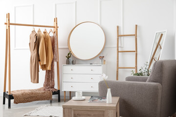 Canvas Print - Interior of stylish dressing room with mirror, clothes and drawers