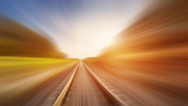 Fototapete - Blurred effect of the railroad in nature in evening.