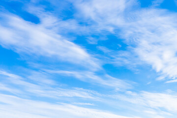 Wall Mural - blue sky with white clouds on a sunny day. natural background