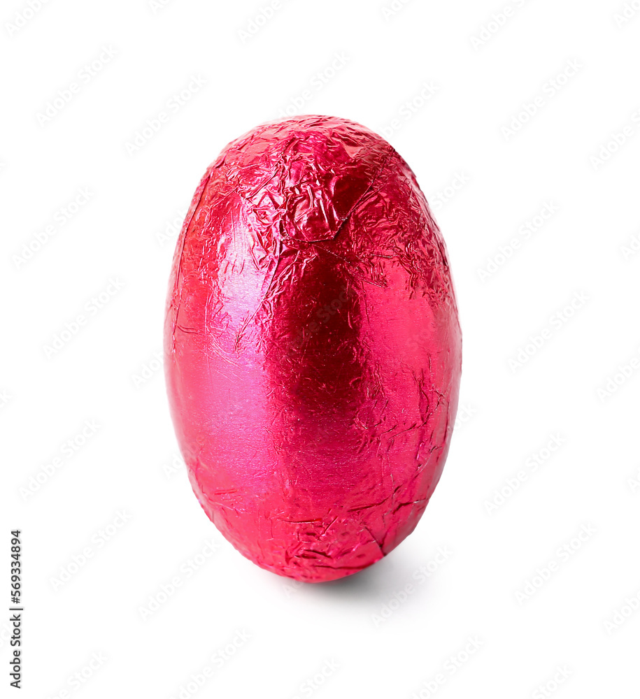 Easter egg in red foil on white background