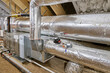 Furnace, air conditioning and duct work in a home's insulated attic
