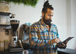 © K Davis/peopleimages.com - Tablet work, barista and cafe owner working on digital retail shop design for business. Coffee shop waiter, ecommerce and man planning a restaurant web page for online shopping and networking