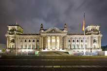 Facade Of A Government Building Lit Up At Dusk, The Reichstag, Berlin, Germany