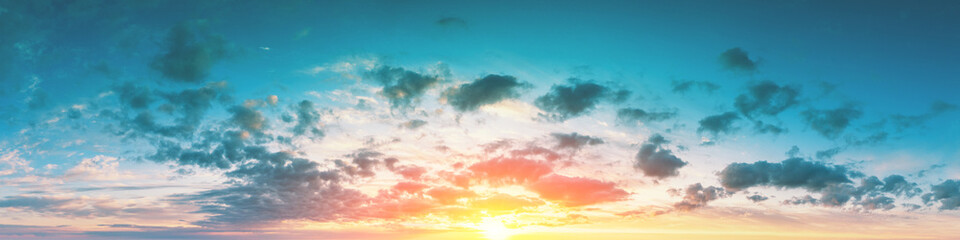 Wall Mural - Cloudy sky at sunset. Cloudy sky background. Horizontal banner
