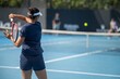 female Professional athlete Tennis player playing on a court in a tennis tournament in summer in australia