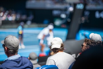 Wall Mural - female Professional athlete Tennis player playing on a court in a tennis tournament in summer in australia