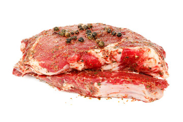 Wall Mural - A piece of red meat on a white background.