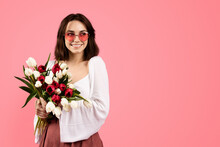 Smiling Young European Female In Glasses With Bouquet Of Flowers, Enjoy Lifestyle And Rejoicing Spring Holiday