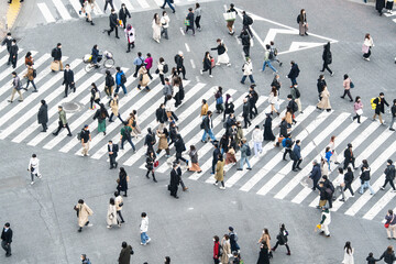 crowded japanese people, asian traveler walk cross road at shibuya scramble crossing. tokyo tourist 